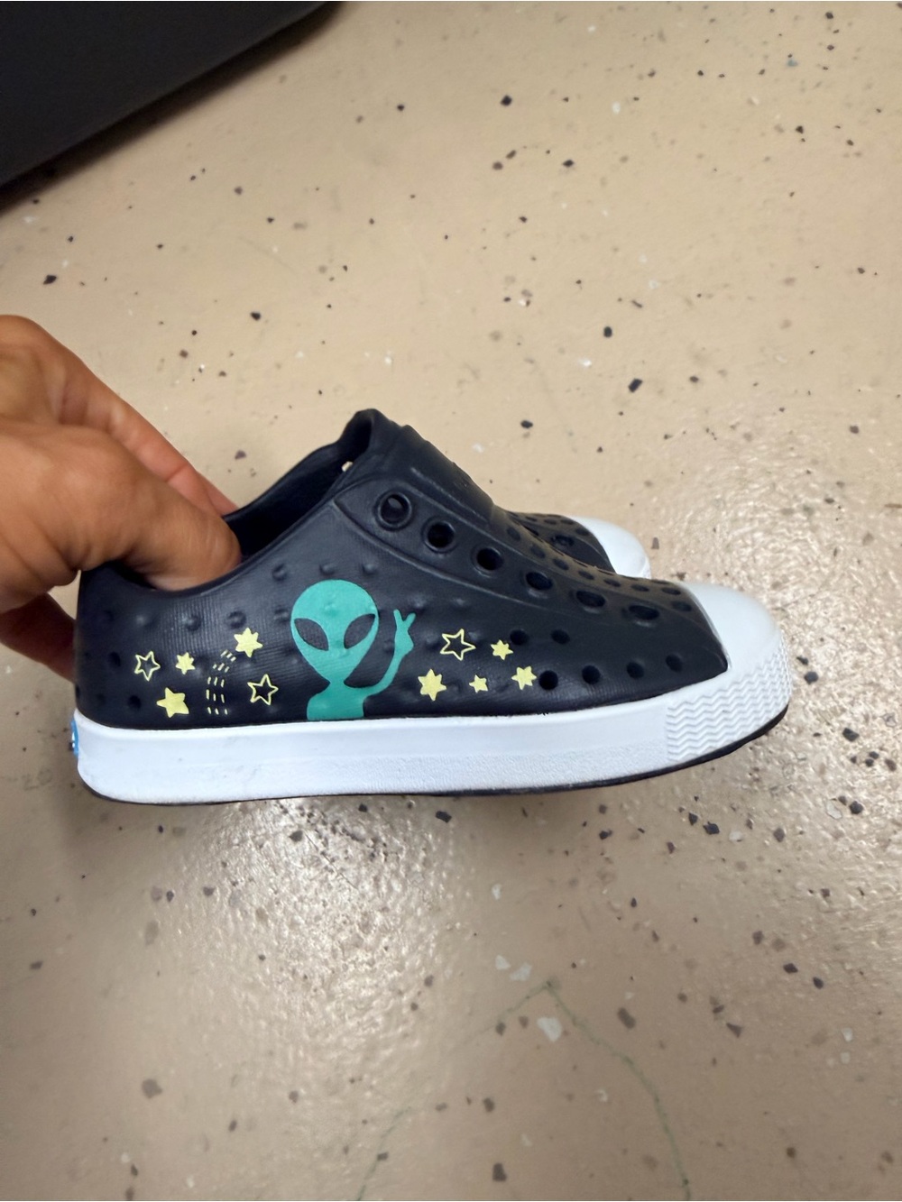 Native Shoes Kids Black Slip-On with Green Alien & Yellow Stars